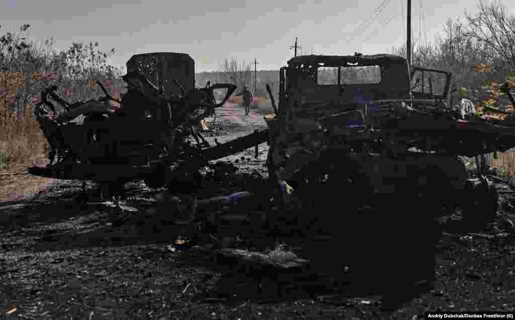 Destroyed vehicles sit on a road near Snihurivka. A highly public announcement of Russia's pullout from most of Kherson left some Ukrainian commanders suspicious of a possible trap, but the November 11 destruction of the crucial main bridge of the city and the relatively easy recapture of villages north of Kherson have revived hopes of an imminent Ukrainian takeover. 
