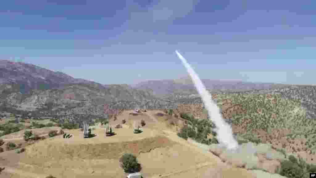 A truck-mounted Iranian missile is fired into Iraq in September 2022. A U.S. State Department spokesperson on September 9 told reporters Washington was "incredibly alarmed" by reports of the Fath-360 missile systems being handed to Russia and warned of unspecified “significant consequences” if the reports were confirmed. 