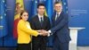Romanian Foreign Minister Luminita Odobescu (left), Moldovan Foreign Minister Mihai Popsoi (center), and Ukrainian Foreign Minister Dmytro Kuleba in Chisinau on July 5.