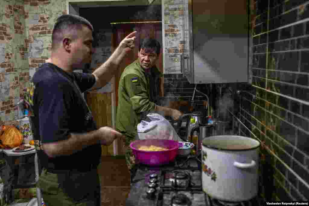A traditional Christmas Eve dinner is prepared by Ukrainian service members on December 24. The change brings Ukraine's Orthodox believers in line with the country's Catholics, who earlier this year approved a similar change in calendars.