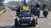 Kateryna Butko (left) at an Automaidan protest in March 2014.
