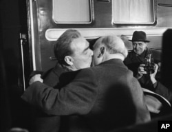 Bulgarian communist leader Todor Zhivkov (right) embraces Soviet leader Leonid Brezhnev in Sofia, Bulgaria, on March 6, 1968.