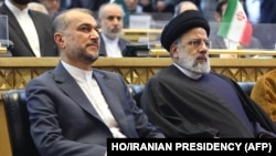 د ايران وژل شوی ولسمشر ایراهیم ریسيي او وژل شوی بهرنیو چارو وزیر حسين امیر عبداللیهان. پخوانی انځور