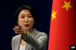 Chinese Foreign Ministry spokesperson Mao Ning gestures during a press conference at the Ministry of Foreign Affairs in Beijing. Mao said that China was willing to help with Finland’s investigation into the incident.