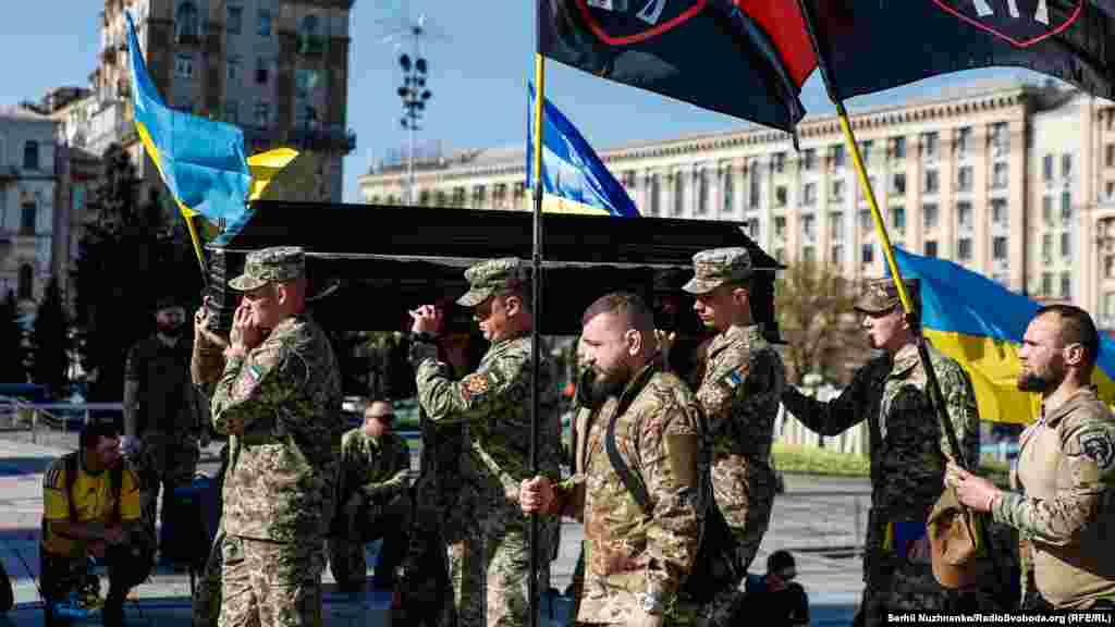 A memorial service was held for two Ukrainian soldiers, Serhiy Konoval and Taras Petryshyn, in Kyiv’s Independence Square on April 8. The best friends served in the same unit and were killed in action two days earlier close to the eastern Ukrainian city of Chasiv Yar. They were buried on April 10, a day before Ukraine's parliament passed a new law to expand the government's powers to issue draft notices and limit exemptions from military service.