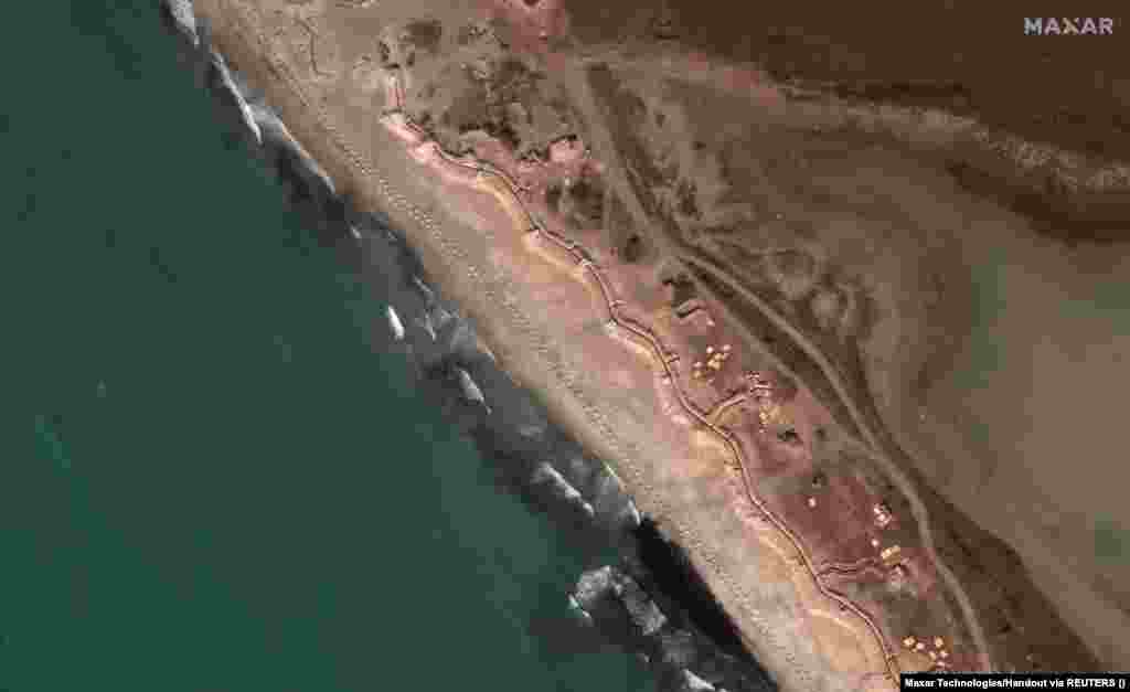 Dragon&#39;s teeth and Russian trenches along the beach west of Yevpatoria, southwest Crimea, on March 12. Ukraine would face a formidable challenge to dislodge Russian forces as its troops would likely encounter minefields, anti-tank ditches, and other obstacles.&nbsp;