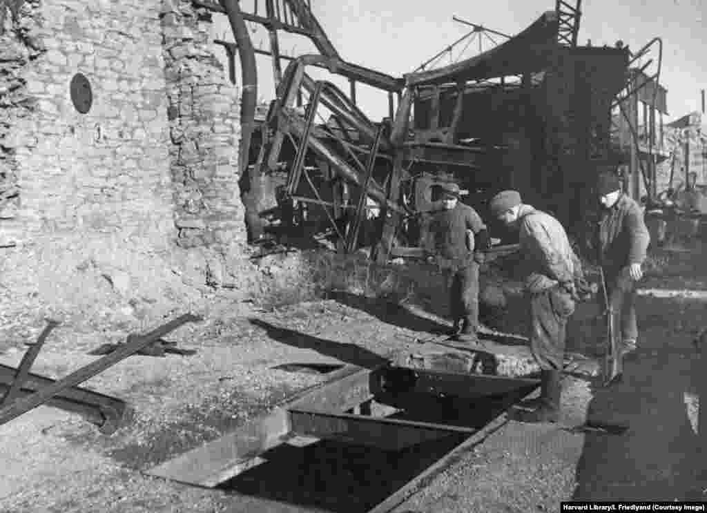 An image whose caption read, “Thousands of of tortured civilians were thrown down the shaft shown above, which is situated in the Kalinovka Colliery not far from Stalino, the capital of Donbas." Donetsk was previously named Yuzovka, after its Welsh founder John Hughes, before being named after Stalin. 