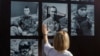 A woman attends a ceremony on Kyiv's Independence Square commemorating soldiers killed in a July 2022 strike that destroyed a building housing Ukrainian prisoners of war in Olenivka, eastern Ukraine. 