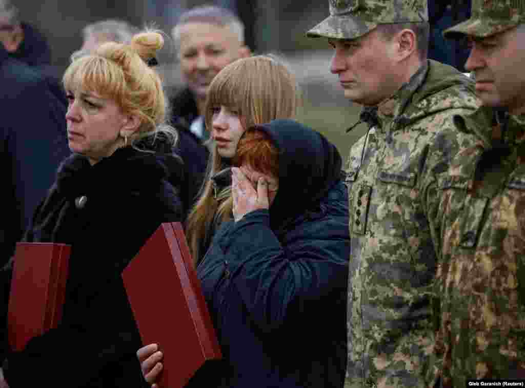 Family members and soldiers paid tribute to those were killed on the first anniversary of the liberation of Bucha on March 31.