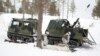 The heavy mortar mounted inside a trailer for the Finnish-made “piglet” tracked vehicle allows a firing crew to lob a dozen mortar rounds in a minute, then escape into the wilderness before an adversary's battery radars can pinpoint their location.