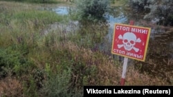 Mines and unexploded ammunition currently are spread across 174,000 square kilometers of Ukraine or about 20 percent of the country, Zelenskiy said.