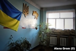 A school in Maryinka with sandbags in the windows as protection from shrapnel.