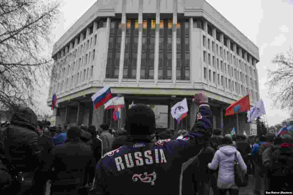 A pro-Russian crowd outside the Crimean parliament on February 27. Earlier that day, around 60 pro-Russian gunmen had seized the building, as well as several checkpoints on the Crimean Peninsula. 