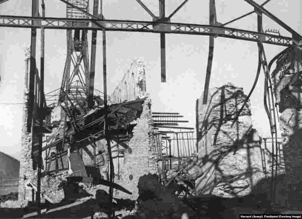 Buildings in a coal mine building that was "wrecked by the Hiterites" as German forces retreated, according to the caption writer. From 2014 onward, the Donbas region has once more been roiled by conflict amid Kremlin-backed separatism that preceded the war that continues today. 
