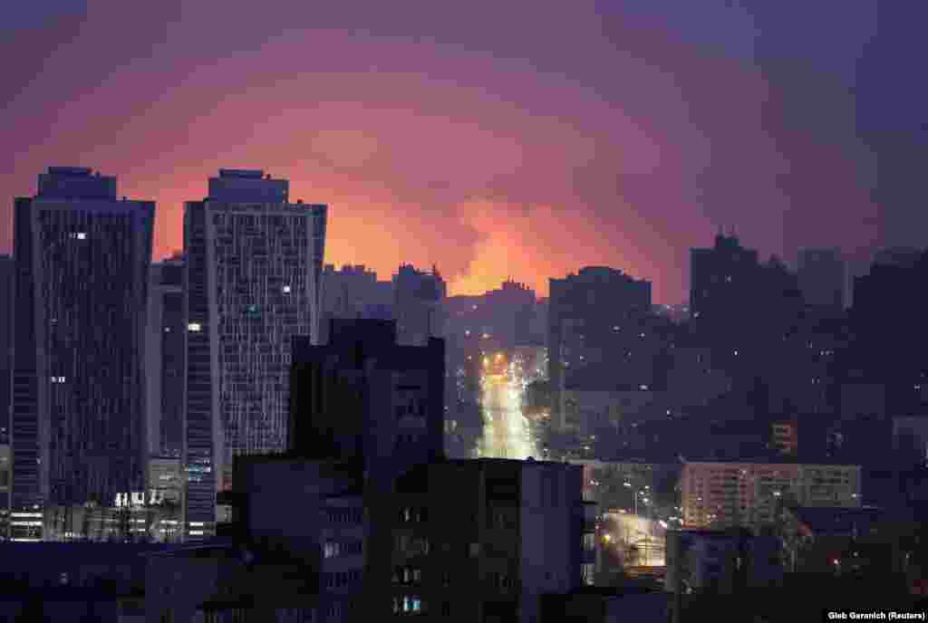 A flash from the explosion of a missile illuminates the capital city of Kyiv during a Russian missile strike on March 21. Authorities reported that at least 10 people were injured, including an 11-year-old girl.