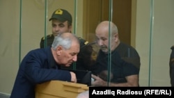 Vagif Khachatrian (right) attends a military court in Baku on October 13.