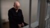 The Belarus-1 state television channel in Minsk on July 25 showed a video of German citizen Rico Krieger, who was sentenced to death on terrorism charges.
