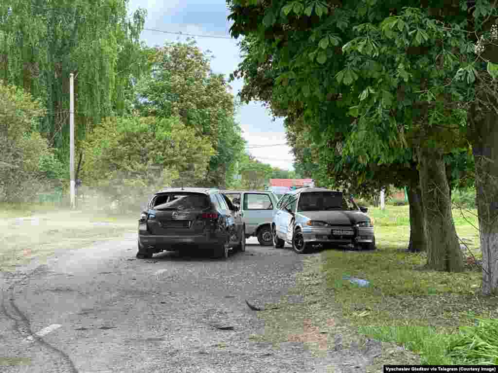 Photos posted to Telegram by Belgorod's Governor Vyacheslav Gladkov on May 23 showed the apparent aftermath of the raid, including these damaged vehicles. The Russian Defense Ministry on May 23 claimed that its troops had surrounded enemy fighters and used "air strikes, artillery fire, and active action by border units" to push back the forces, killing many of them. Those claims have not been independently confirmed. 