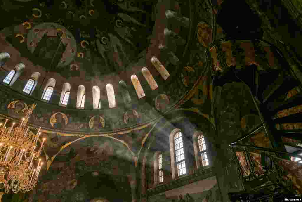 Sunlight streams through the interior of the Refectory Church of the Kyiv lavra. The monastery complex was founded in 1051 and is described by UNESCO as “one of the most important Christian pilgrimage centers in the world.” 