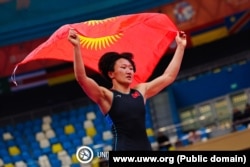 Kyrgyz wrestler Aisuluu Tynybekova, seen in a file photo, is a three-time world champion.