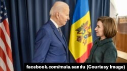 U.S. President Joe Biden and Moldovan President Maia Sandu meet in Warsaw on February 21. 