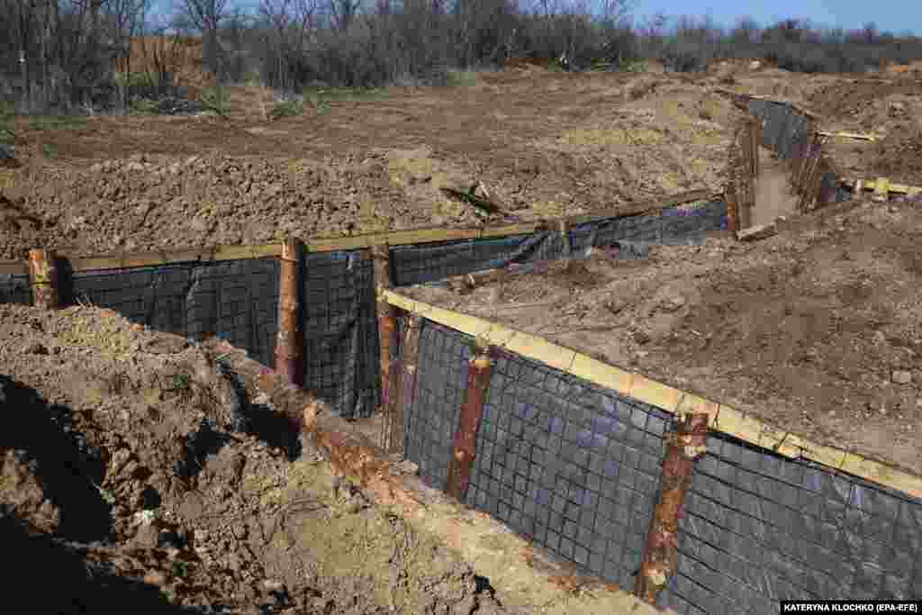 A recently constructed trench fortification Nearly 25 months into Russia's full-scale invasion of Ukraine, World War I-style tactics continue to dominate the landscape.