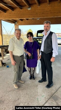 Radu Stefanescu (right) with the former owners of the house