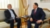Former Ukrainian Ambassador to Kazakhstan Petro Vrublevskiy (left) with Kazakh Deputy Foreign Minister Ermukhambet Qonysbaev (file photo) 