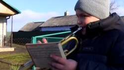 Ukraine's Teenage Trumpeter Plays For The Fallen