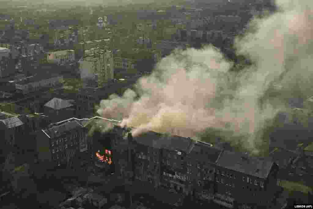 An apartment building in Bakhmut burns after Russian shelling on December 7. Russian forces continued their relentless rocket attacks and bombardments on Ukrainian positions in Donetsk, with particular focus on Bakhmut -- a city that has been under attack for nearly seven months.