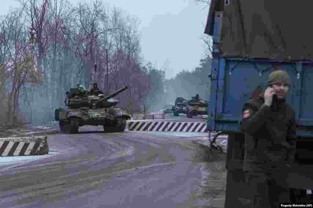 Ukrainian tanks roll toward the front line in the Donetsk region. Ukrainian troops are defending Bakhmut's northern, eastern, and southern approaches against Russian forces, who are launching ferocious attacks to seize territory that some analysts say is of no strategic military value.