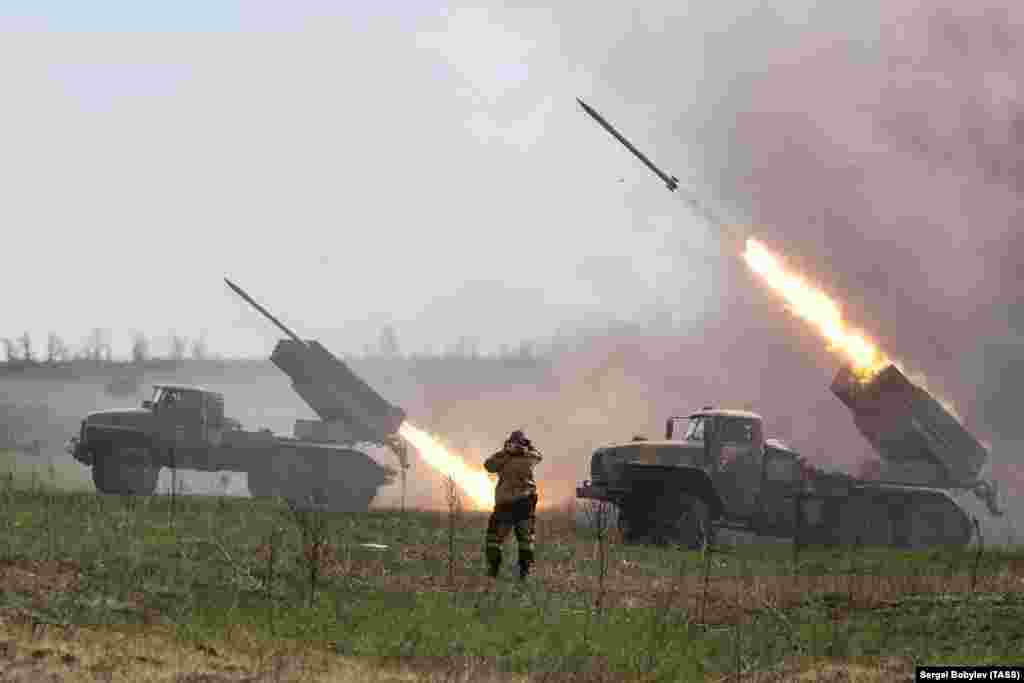 Moscow-backed separatist fighters fire a volley of Grad rockets at Ukrainian forces in the Donetsk region on April 11. 