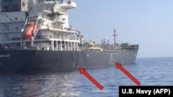 A slide provided by U.S. Central Command damage shows an explosion (left) and a likely limpet mine can be seen on the hull of the civilian vessel M/V Kokuka Courageous in the Gulf of Oman on June 13.