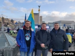 Denys Kosenko (center) with some friends during the Maidan protests in Kyiv.