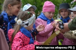 Children attend the opening of a sports and patriotic camp at the base of the 38th Brest Separate Guards Assault Brigade.