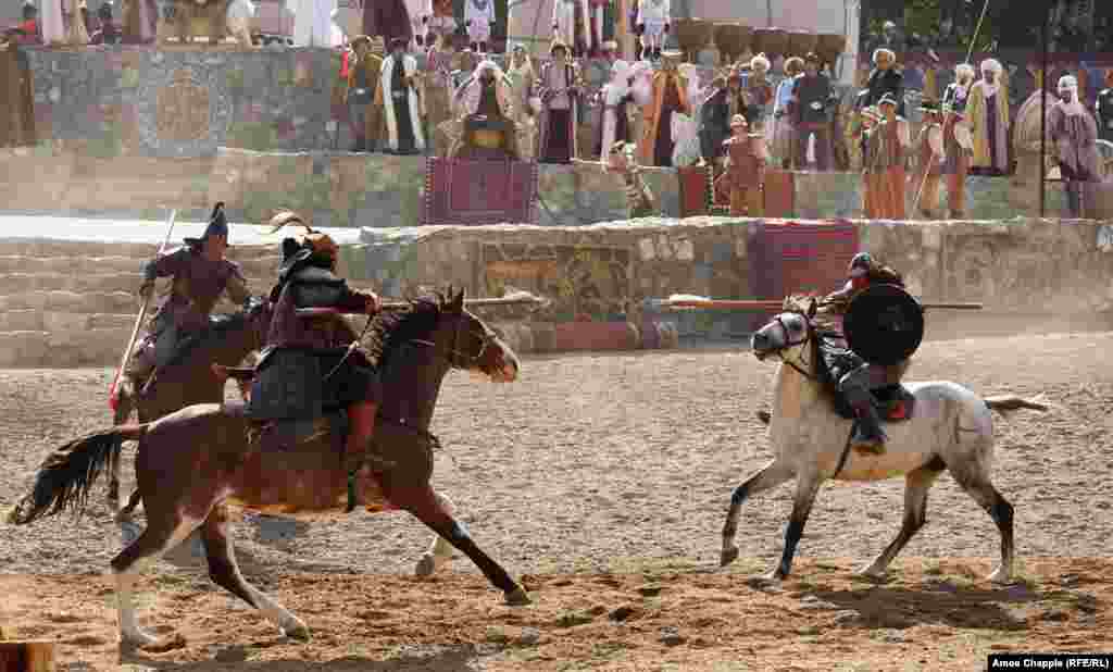 Another traditional Turkic challenge played out as jousters engaged in high-speed passes. Amid the dust-clouded chaos of the ceremony, it was sometimes hard to tell if tumbles were choreographed or painfully accidental.
