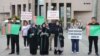 Turkmen citizens protest against the Turkmen authorities outside their country's embassy in Istanbul.