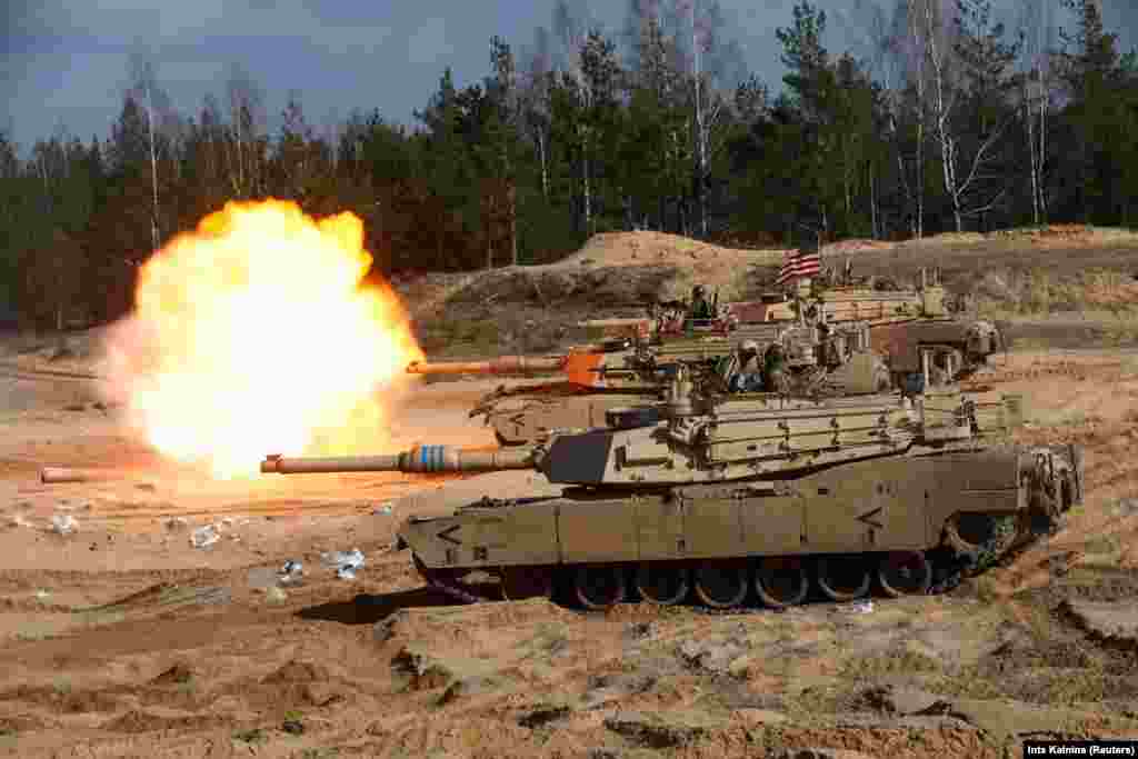 M1A1 Abrams tanks participate in a NATO exercise in Adazi, Latvia, on March 26, 2021. Moscow said providing the tanks to Ukraine would be a "blatant provocation."