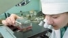 A research worker examines a sample at Russia's State Research Center of Virology and Biotechnology (Vector) in Koltsovo, near Novosibirsk, where 120 different strains of the variola virus are kept.