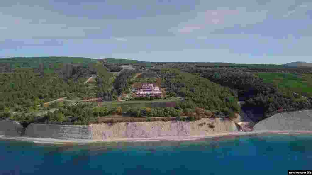 Ten kilometers down the coast from the palace is this vineyard, with a sprawling chateau allegedly owned by people with close links to Putin. 