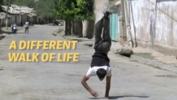 Tajik Polio Victim Finds A Better Way To Walk, Hands Down