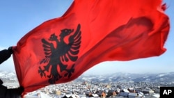 Serbia's football association asked for the Kosovar journalist's removal, saying that he provoked Serbian fans by making a gesture with his hands that mimics the double-headed eagle on Albania's national flag. (file photo)