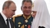 Зліва направо: російський президент Володимир Путін, міністр оборони Росії Сергій Шойгу і Московський патріарх Кирило (архівна світлина)