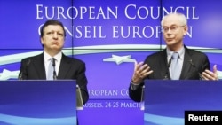 European Commission President Jose Manuel Barroso (left) and European Council President Herman Van Rompuy address a news conference at the end of an EU leaders summit in Brussels. 