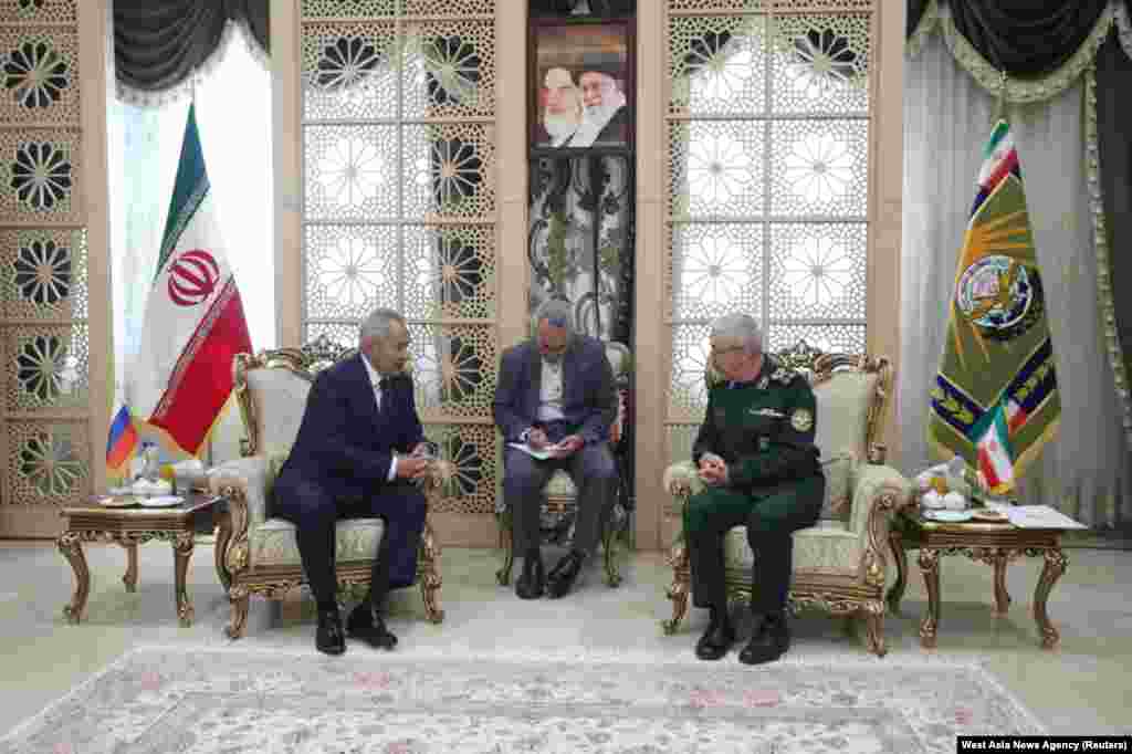 Iran’s military chief, Major General Mohammad Bagheri (right), meets with Russian Security Council chief Sergei Shoigu in Tehran on August 5. Reports that Tehran was training Russian soldiers in using Iranian missiles emerged after this meeting between top military officials of Russia and Iran. 