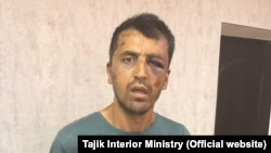 An image of Hussein Abdusamadov in Tajik police custody.