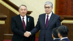 Former Kazakh President Nursultan Nazarbaev (left) and current incumbent Qasym-Zhomart Toqaev (file photo)