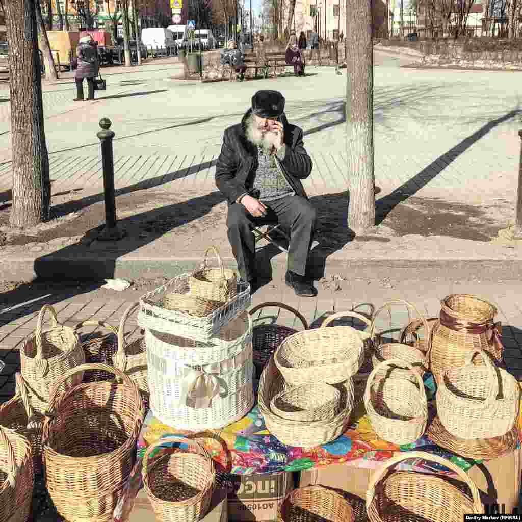 A basket seller in the town center. Photographer Dmitry Markov says most people he spoke to were Putin supporters. 