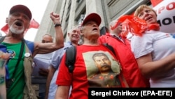 Russians protest in front of the State Duma against pension reform in Moscow in August.