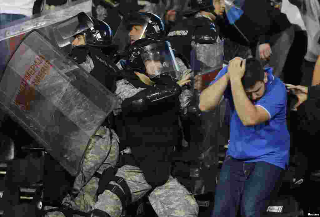 Serbian riot police clashed with the fans during the match...